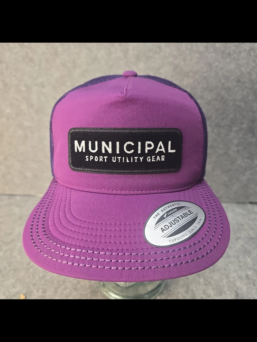 Municipal purple trucker